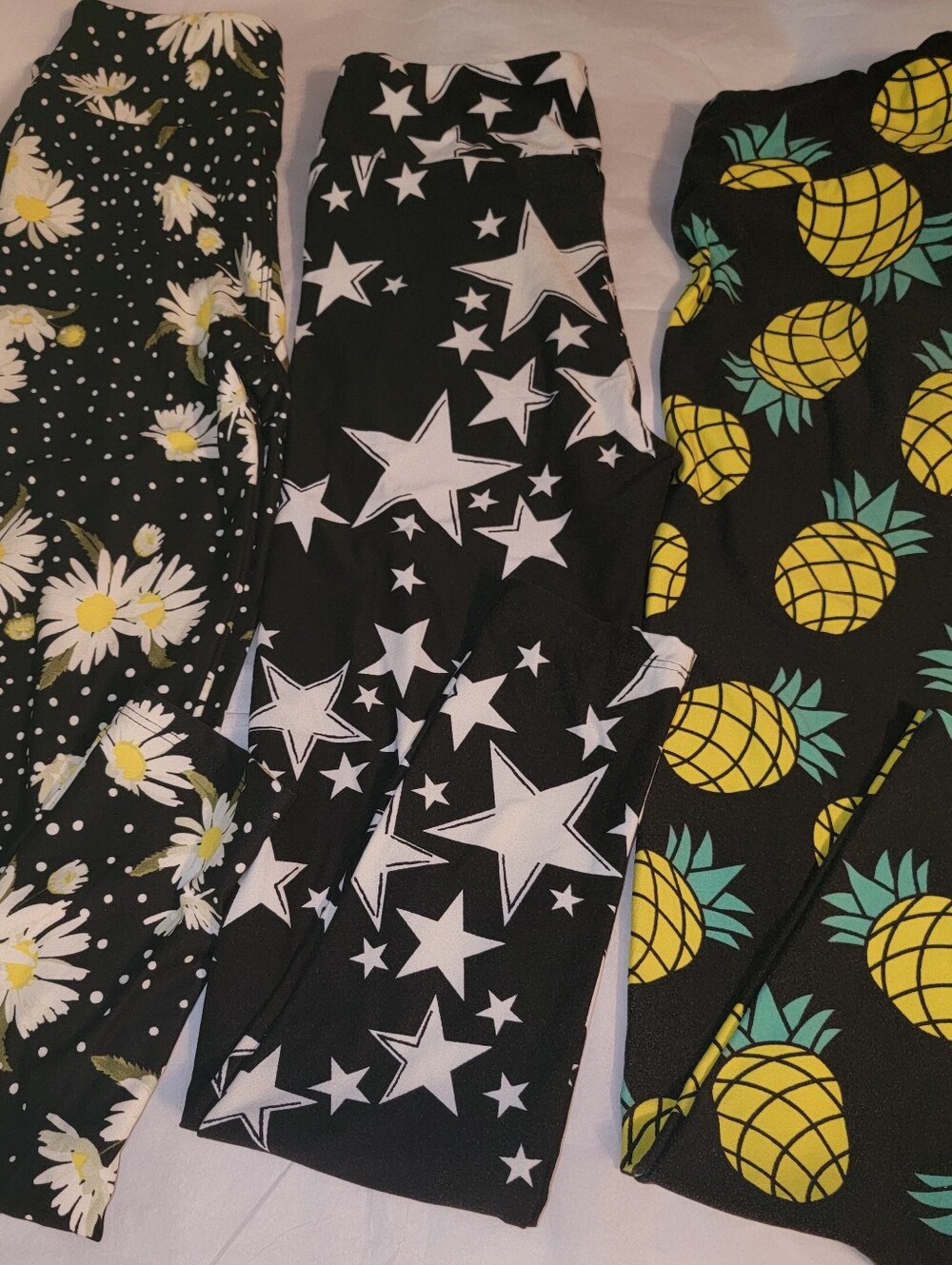LuLaRoe Set Of 3 - Black with Daisy, Star and Pineapple Print Kids Leggings